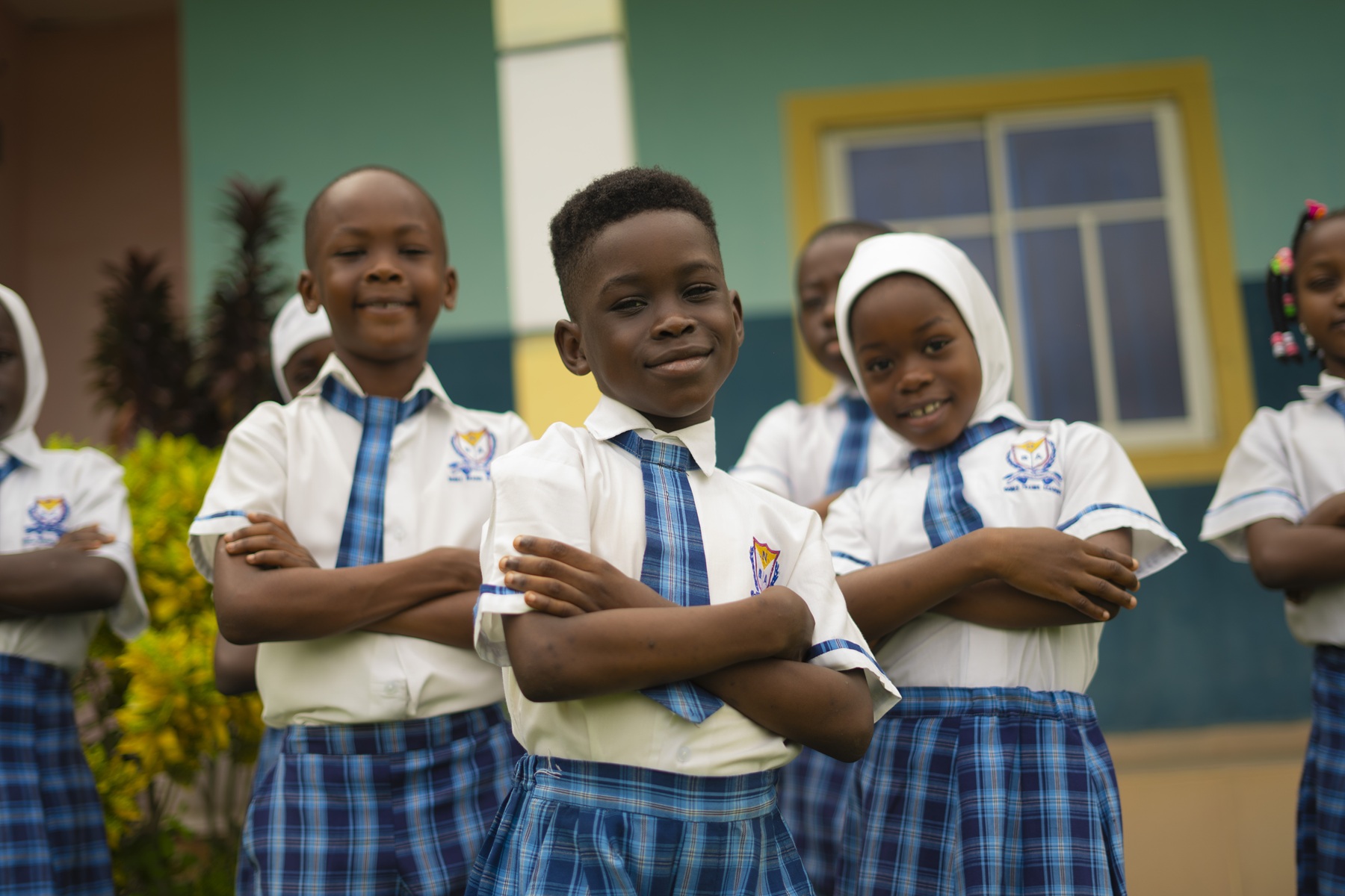 Noble Brains Academy students standing confidently in uniform